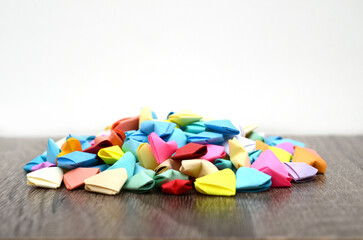 Colorful origami hearts pile