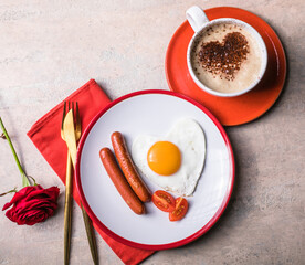 Valentine's day breakfast concept. Valentines fried eggs in the shape of a heart, coffee with heart