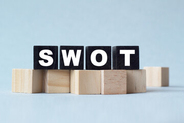SWOT. The text is on the dark and light cubes. Bright solution for business, financial, marketing concept