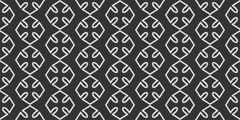 Simple ornament on a black background. Seamless wallpaper texture