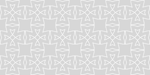 White pattern on a gray background. Seamless wallpaper texture, monochrome