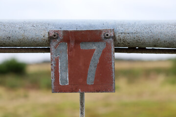 number seventeen on fence - obrazy, fototapety, plakaty