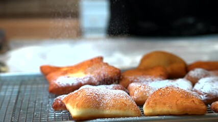 Baking - Sugar over beignets - Powered by Adobe
