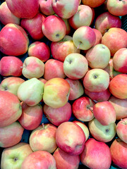 organic natural background of red apples in the market