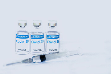Vaccine covid19 in vials with syringe isolated white background, Mers-Cov ,Concept vaccine in vials for stop. Flu coronavirus pathogen that attacks the respiratory tract. Pandemic virus infection