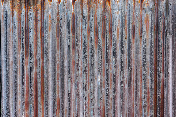 錆びた金属の波の板