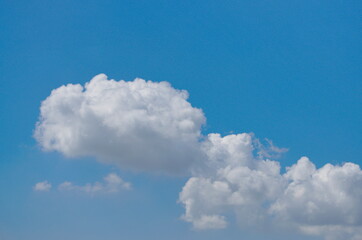 Blue sky background with tiny clouds background.