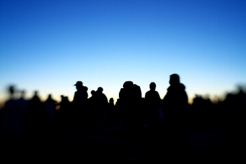 Tokyo,Japan-January 1, 2021: Silhouette of people on a hilltop 
