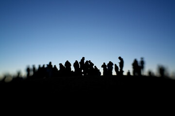 Tokyo,Japan-January 1, 2021: Silhouette of people on a hilltop 
