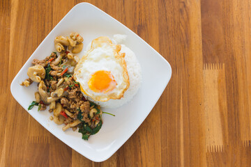 Rice topped with stir-fried pork and basil