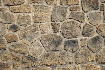 Closeup of fitted flagstone wall with contrasting mortar