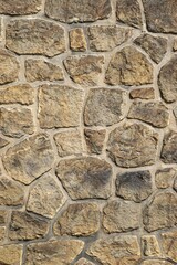 Ancient stone wall mosaic all over vertical background pattern