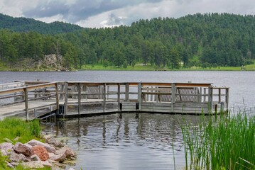 Fototapeta premium Fishing dock on lake in the Black Hills, South Dakota