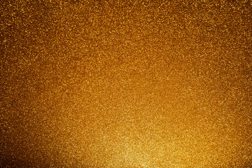 Fototapeta premium gold Sparkling Lights Festive background with texture. Abstract Christmas twinkled bright bokeh defocused and Falling stars.