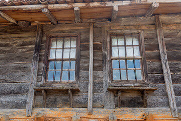 Detail from old wooden and stone house in a village