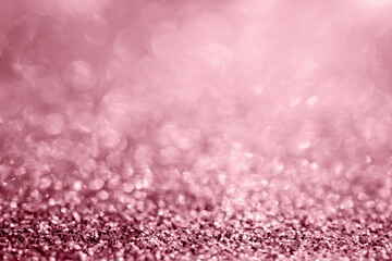 Fototapeta premium Abstract rose gold glitter sparkle texture with bokeh background