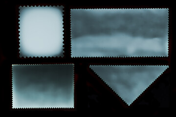 Set of old grunge posted stamp reverse side of different geometric shapes isolated on black background
