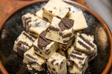 A plate of delicious cookie fudge cake squares