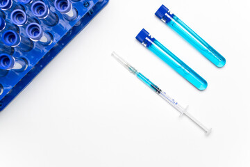 Vial syringe. Medical syringe with needle for protection flu virus and coronavirus. Covid vaccine on white. Medicine concept vaccination hypodermic injection treatment.