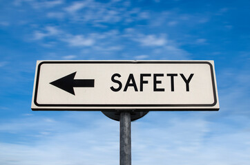Safety road sign, arrow on blue sky background. One way blank road sign with copy space. Arrow on a pole pointing in one direction.