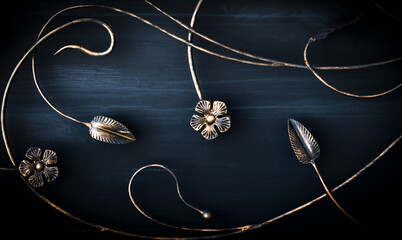 Beautiful forged leaves on a metal gate