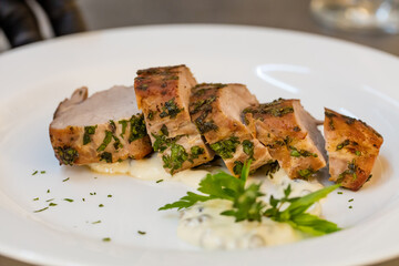 Cooking fresh meat in a dark kitchen 