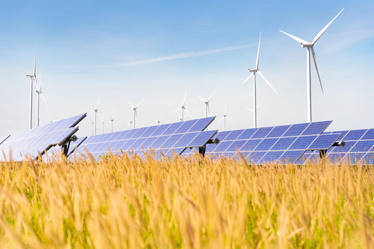 Solar plant with the wind farm in the summer season, hot climate causes increased power production and If strong winds will add the power generated, Alternative energy to conserve the world's energy