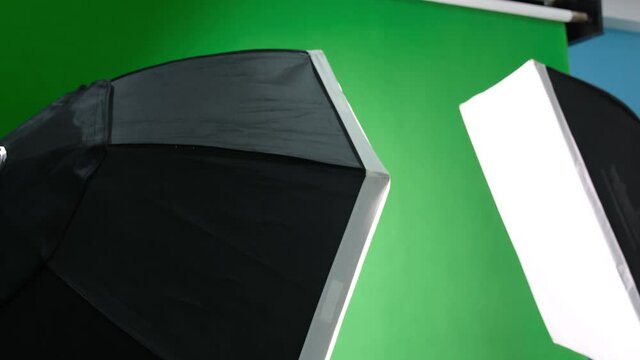 Studio soft light back screen. Lighting studio equipment. Green screen.