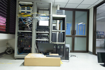 The system administrator works in the server room of the data center. 