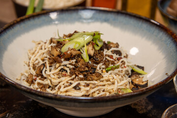A bowl of spicy noodles