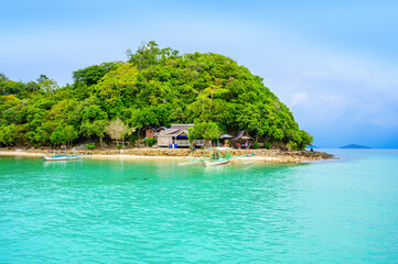 Cayoya Island (also known as Exotic Island) in Port Barton Bay with paradise white sand beaches - Tropical travel destination in Palawan, Philippines