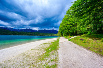 Paradise beach at Eibsee lake.  Beautiful landscape scenery with clear blue water in German Alps at Zugspitze mountain - Garmisch Partenkirchen, Grainau - Bavaria, Germany, Europe.