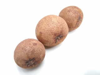Fototapeta premium sapodilla (Manilkara zapota) fruits isolated on white background