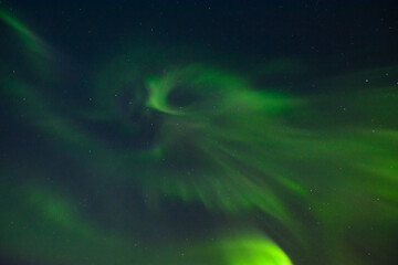 Aurora borealis in the sky at night.