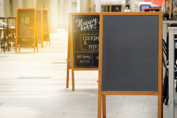 Special menu announcement board.  Chalkboard stand for menu restaurant and cafe welcome easel with copy space and clipping path.