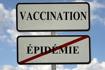 Concept d'incitation à la vaccination contre une épidémie avec un panneau de circulation routière