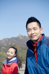 Young couples take pictures in the Great Wall Tourism