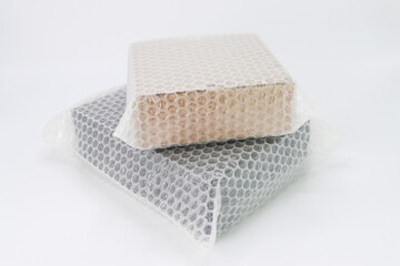 Bubbles covering the box by bubble wrap for protection product