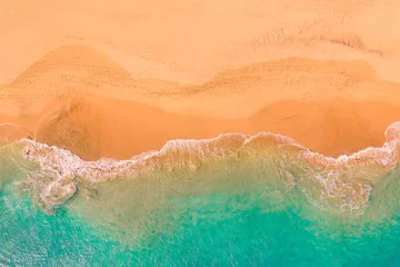 Fotobehang Aerial top down view of beautiful Atlantic ocean coast with crystal clear turquoise water and sandy beach © János Illési
