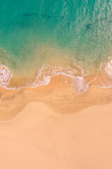 Fototapeta na wymiar Aerial top down view of beautiful Atlantic ocean coast with crystal clear turquoise water and sandy beach