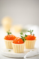 red salted salmon caviar in tartlets