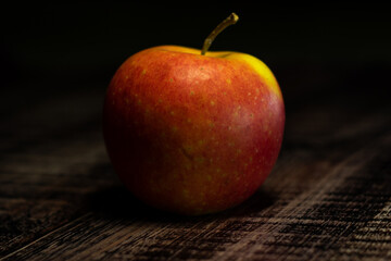 red apple on wooden background