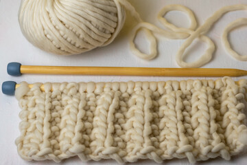mistake rib knitting stitch pattern on chunky wooden needles 