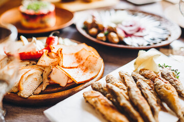 delicious European and Slavic cuisine on the big table waiting for guests. table with food, top view