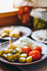 The restaurant table with Ukrainian and European cuisine is served with various delicious dishes for the reception