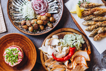 delicious European and Slavic cuisine on the big table waiting for guests. table with food, top view
