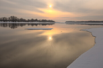 Fototapeta premium sunset over the river in the early spring