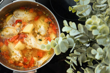 Soup with poultry, potatoes and greenery