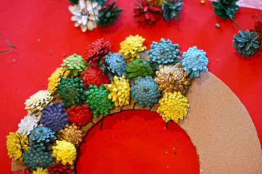 Step 3 - How to make a Christmas wreath from pinecones, cardboard, and a glue gun. New Year's decor. Creative crafts. Do it yourself. DIY. Step by step photo instruction. Top view. 