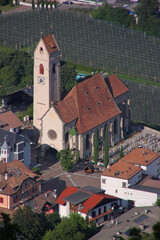 Fototapeta premium Marling village center with a gothic church and its cemetery near Merano, South Tyrol in Italy